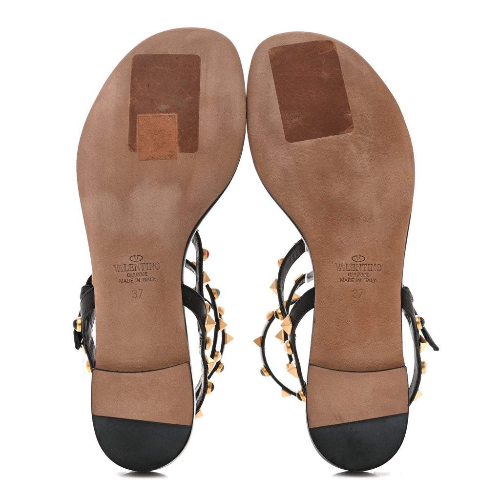 CALFSKIN ROCKSTUD ROLLING ANKLE WRAP FLAT THONG SANDALS BLACK