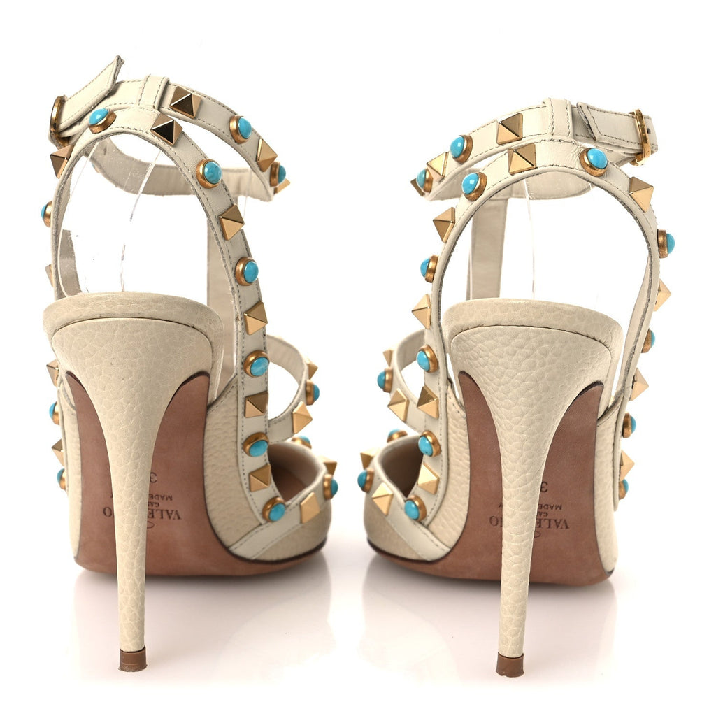 PEBBLED CALFSKIN TURQUOISE ROCKSTUD ROLLING ANKLE STRAP 100MM PUMPS IVORY