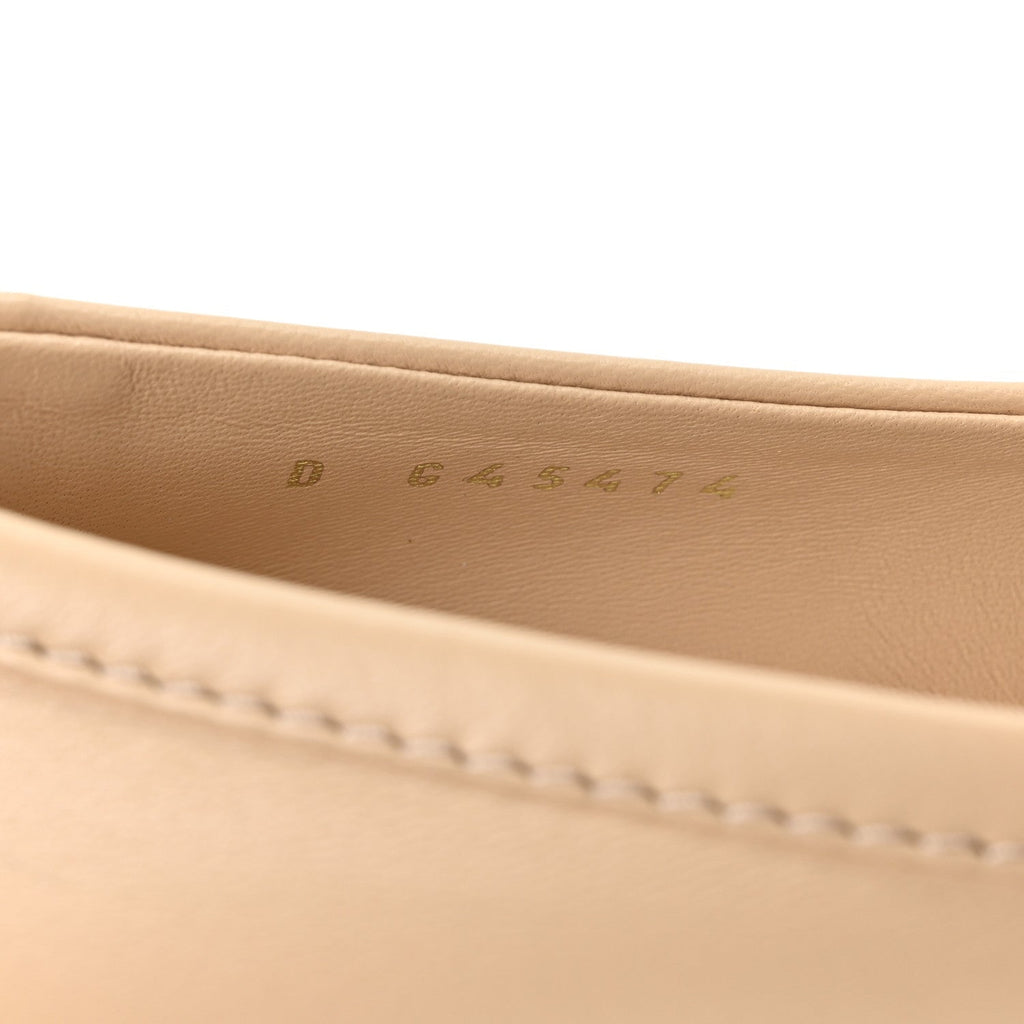 LAMBSKIN QUILTED CC TURNLOCK LOAFERS BEIGE