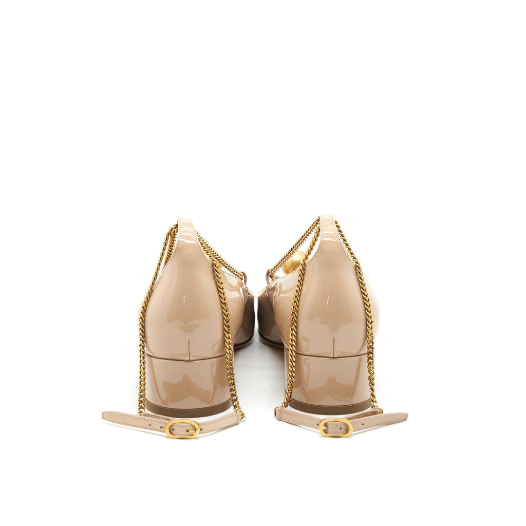 CHRISTIAN DIOR PATENT LEATHER PUMPS IN BEIGE