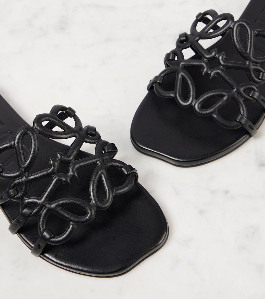 LOEWE PETAL ANAGRAM SLIDE IN BLACK CALFSKIN