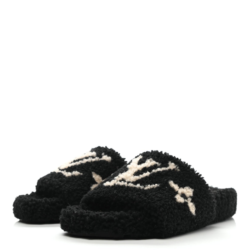 LOUIS VUITTON SHEARLING BOM DIA FLAT MULE IN BLACK