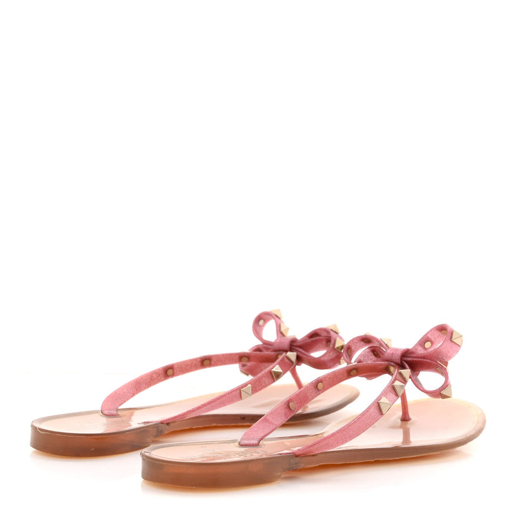 PVC JELLY GLITTER ROCKSTUD BOW THONG SANDALS PINK