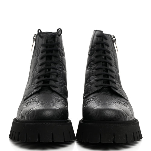 CALFSKIN EMBOSSED MONOGRAM LACE UP ANKLE BOOTS BLACK