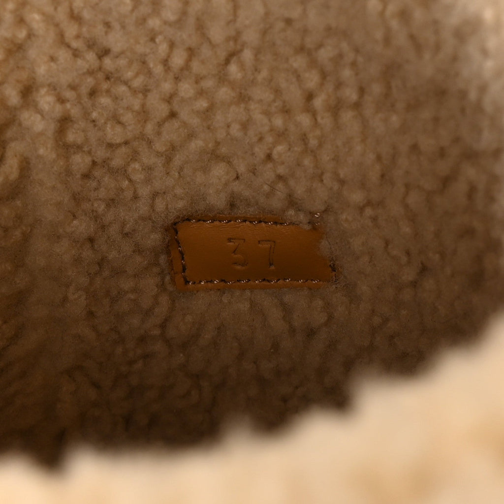 COVERED WOOL MONOGRAM TEXTURED DOLLAR CALFSKIN SHEARLING HORSEBIT SNOW BOOTS UNDERWOOD BLUE HAZEL BROWN